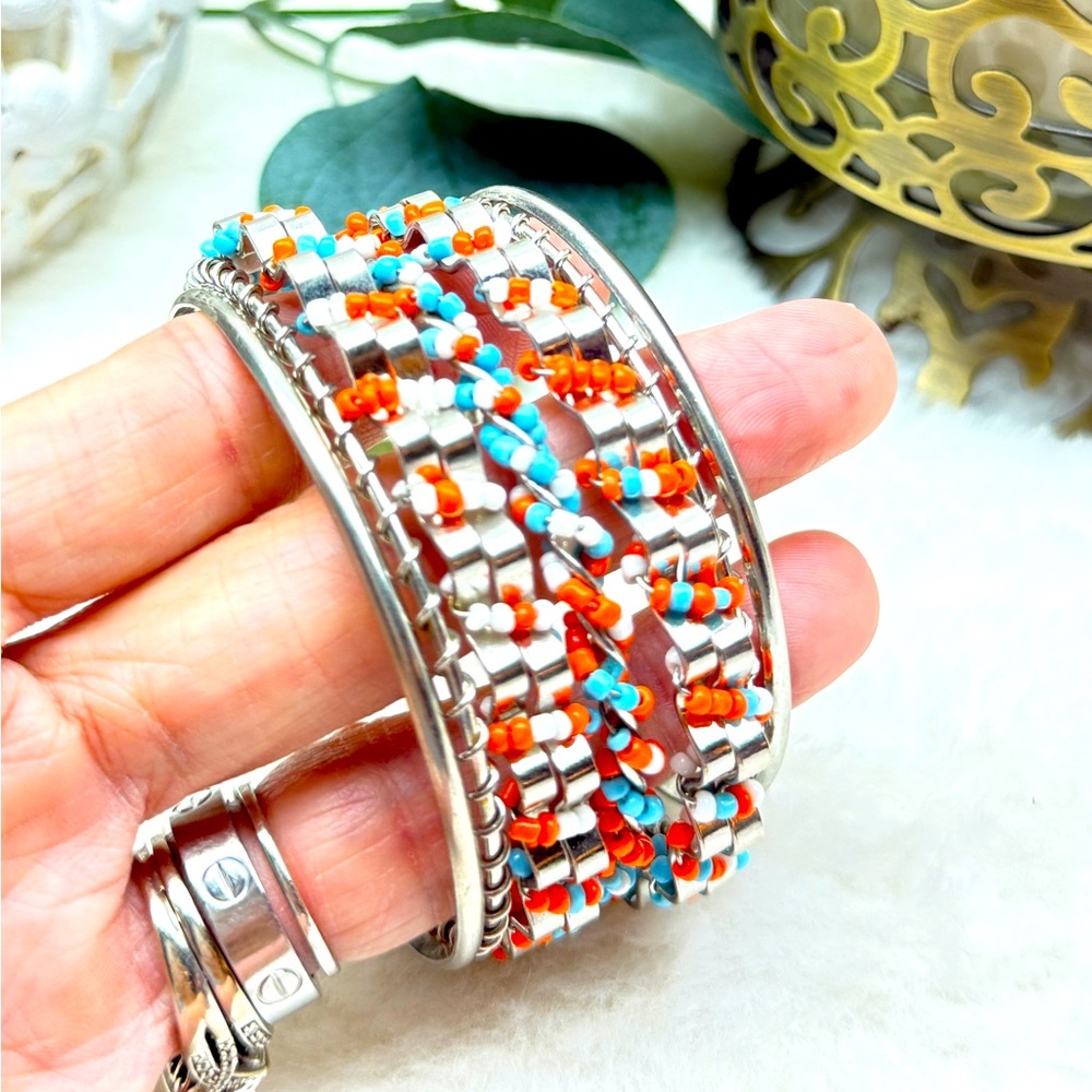 Silver Beaded Bracelet with Orange and Blue Accents